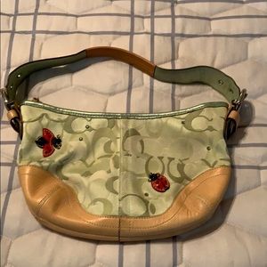 Coach small shoulder purse.